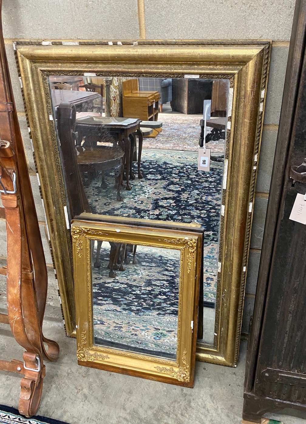 A 19th century French rectangular giltwood wall mirror, width 73cm, height 119cm together with a smaller rectangular gilt framed wall mirror